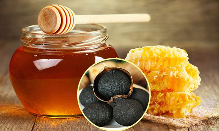 Công dụng của tỏi đen ngâm mật ong chữa đau dạ dày